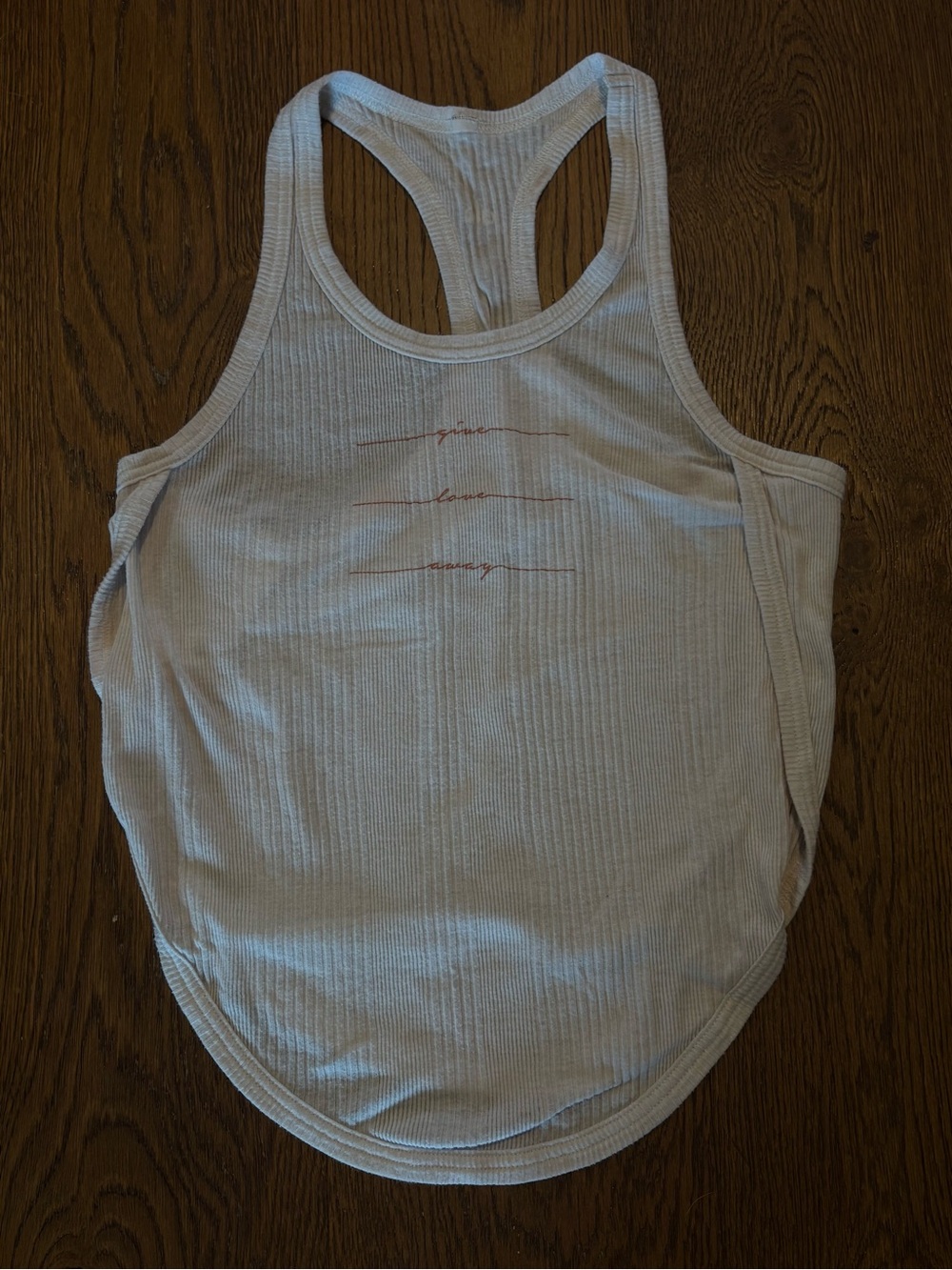 ALO Yoga Ribbed White Racerback Tank with Subtle Pink Script